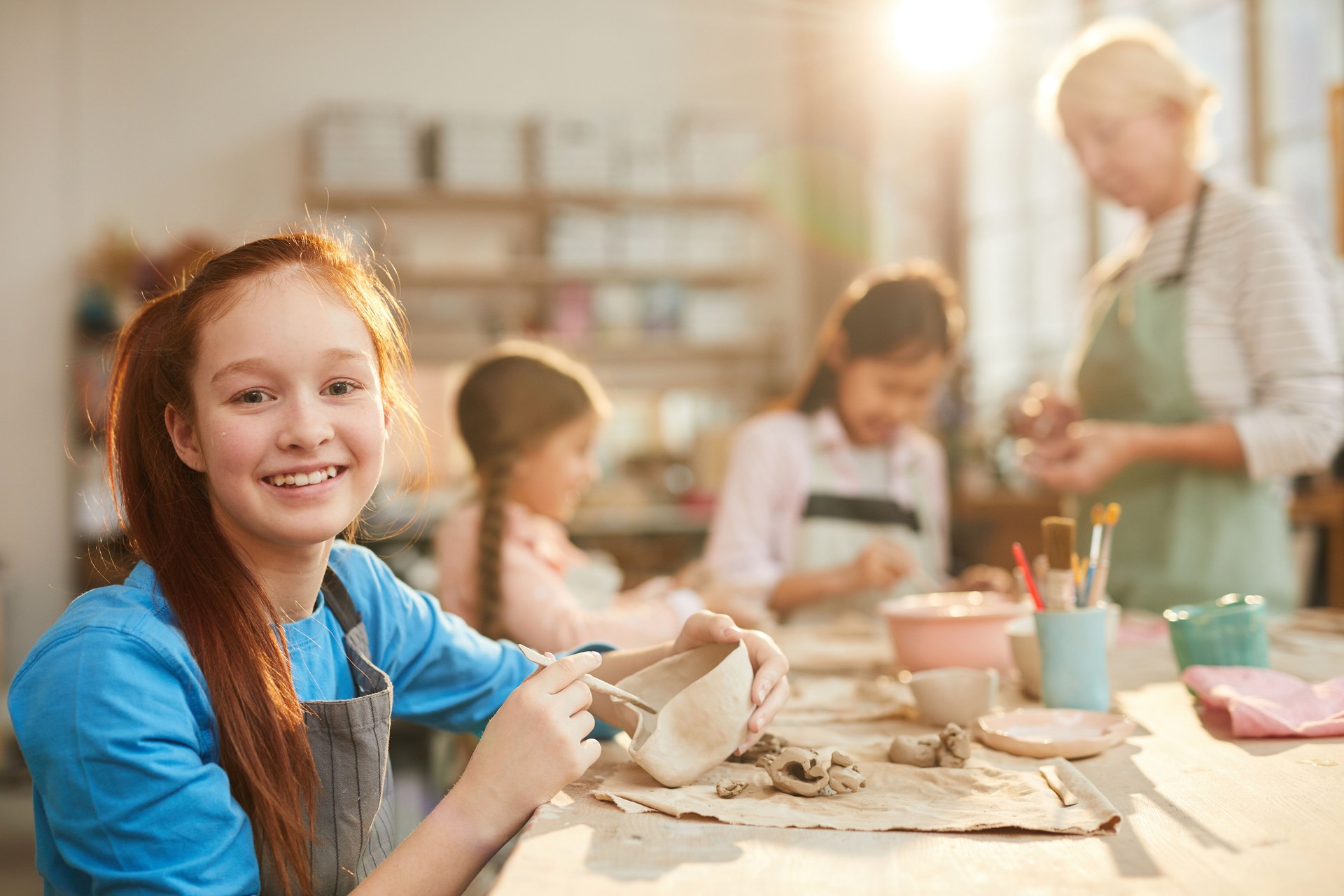 Teenage Girl in Pottery Studio